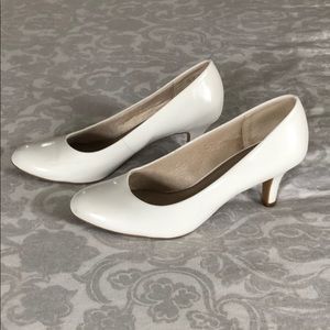 Like new white pumps.